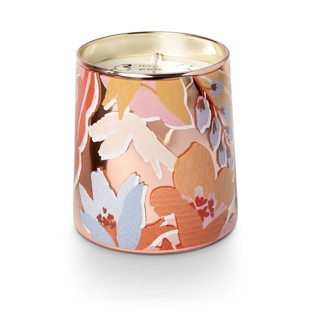 Blood Orange Dahlia Pearl Glass Candle | A pearlescent glass candle with a pink/peach/blue floral pattern.