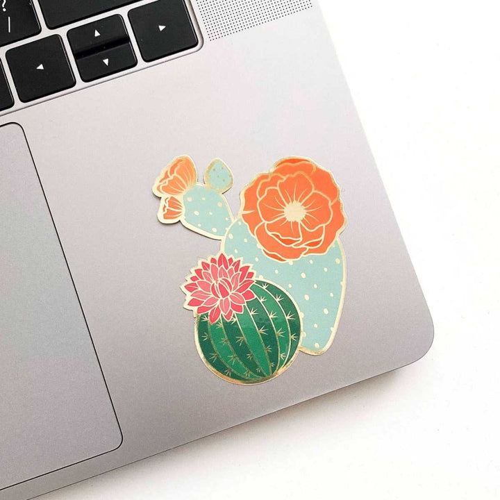 Blooming Cacti Sticker | The colorful sticker is stuck to a laptop.