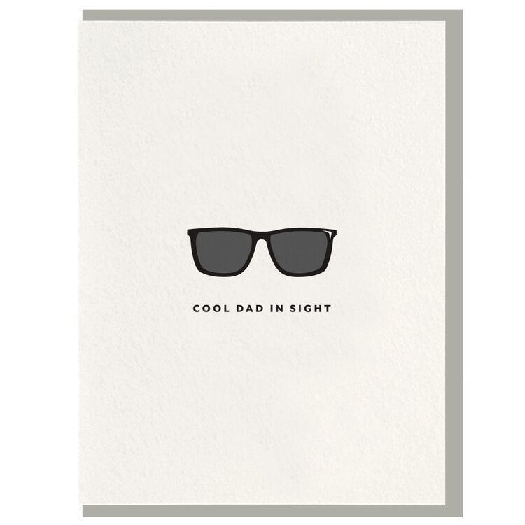 Cool Dad In Sight | Dahlia Press | A simple white card with hand illustrated sunglass and text that reads "Cool Dad In Sight". Comes with a matching gray envelope.