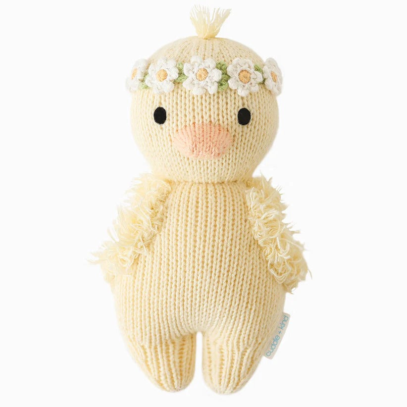 Cuddle + Kind | Hand knit baby duckling with an ivory flower crown.