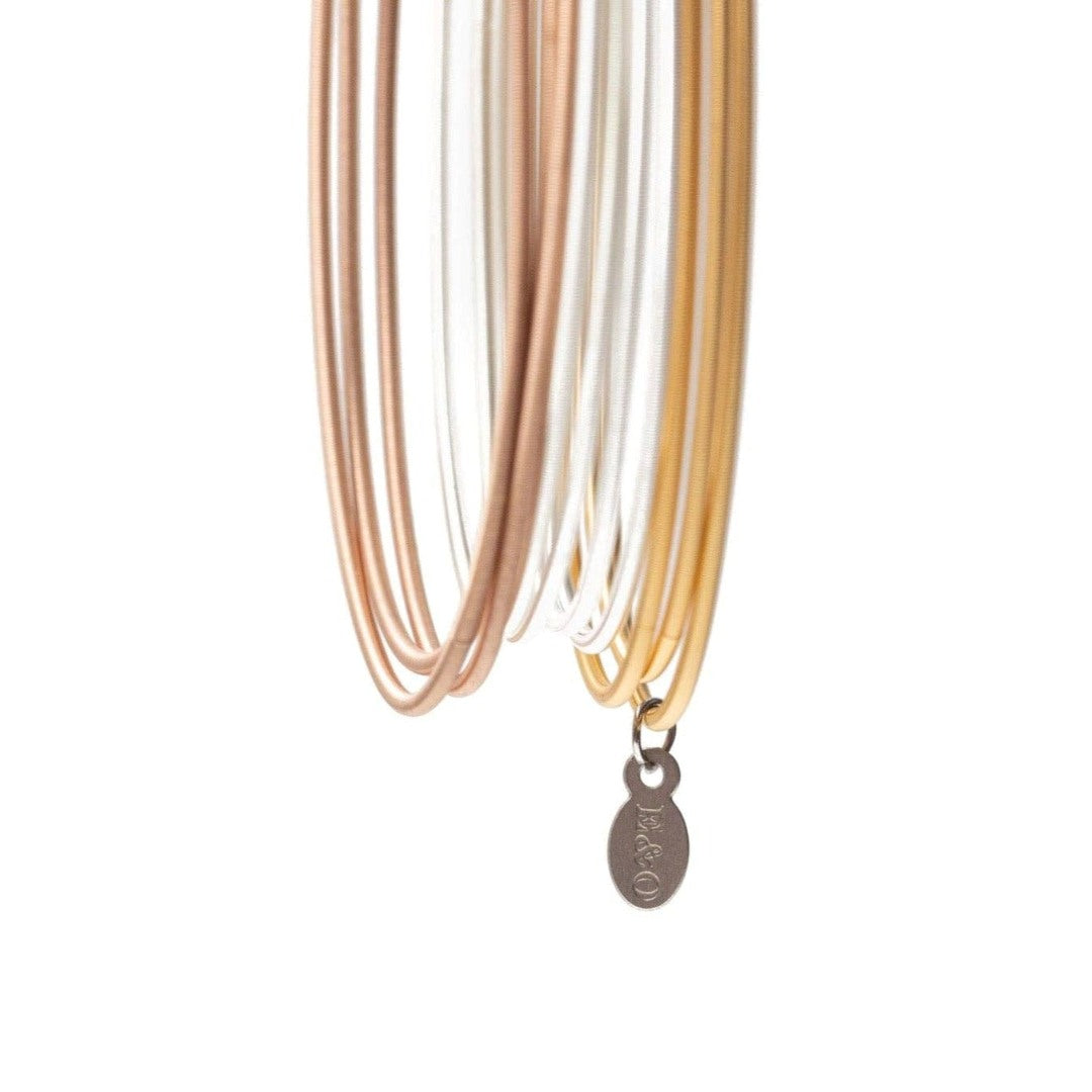 EMERSON & OLIVER | set of 10 warm metals (gold, rose gold, and silver) bracelets.