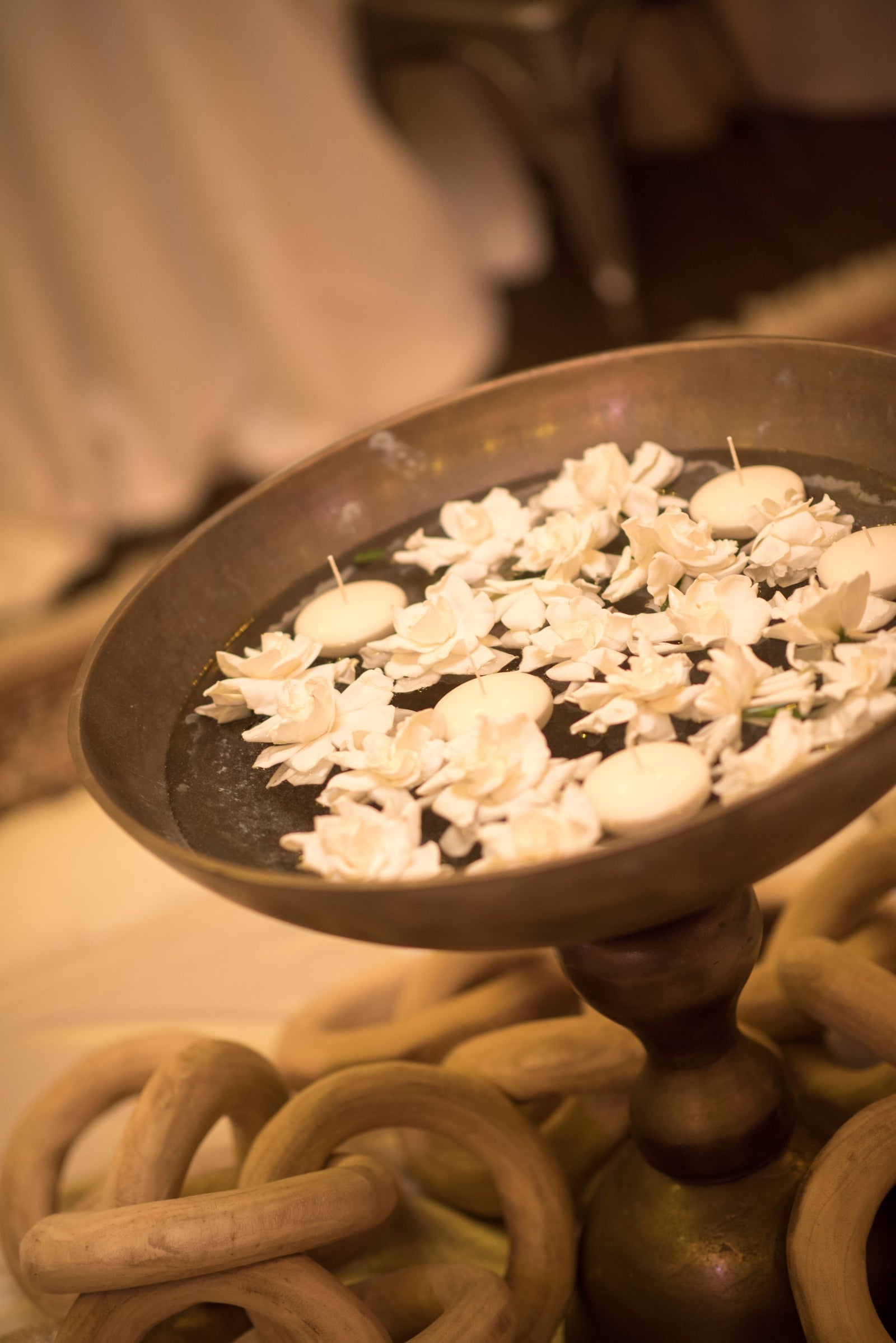 BOWL OF FLOATING CANDLES AND GARDENIAS