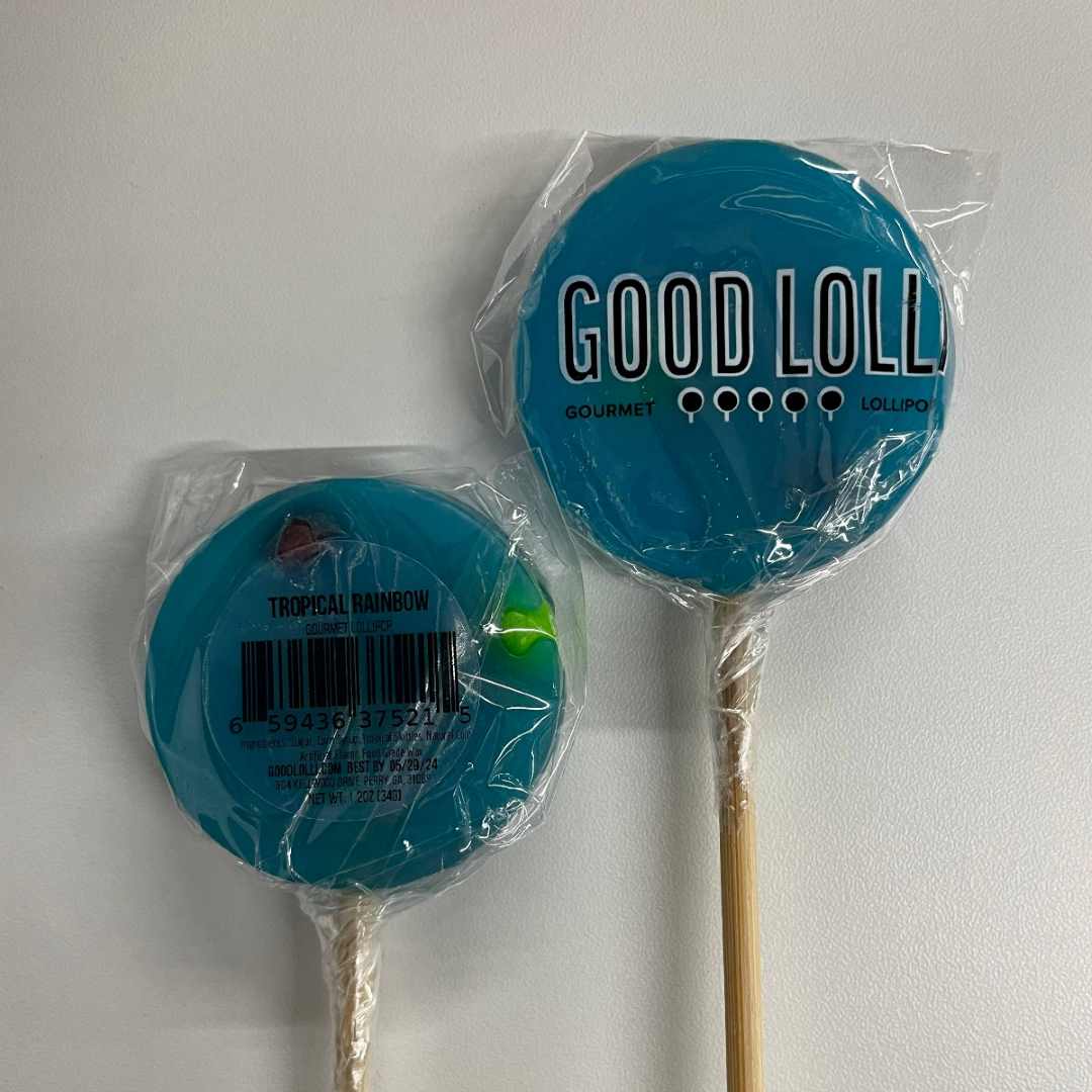 Good Lolli | TROPICAL RAINBOW LOLLIPOP | A blue lollipop with colorful candies on the interior.
