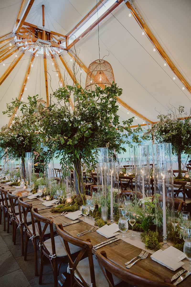 Inns of Aurora | Stacy K Floral | Organic moss wedding with mini trees and taper candles. Table setting at the reception.