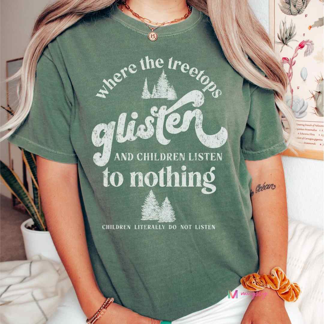 Mugsby | A green shirt with white text that reads "Where the treetops glisten and children listen to nothing, children literally do not listen"