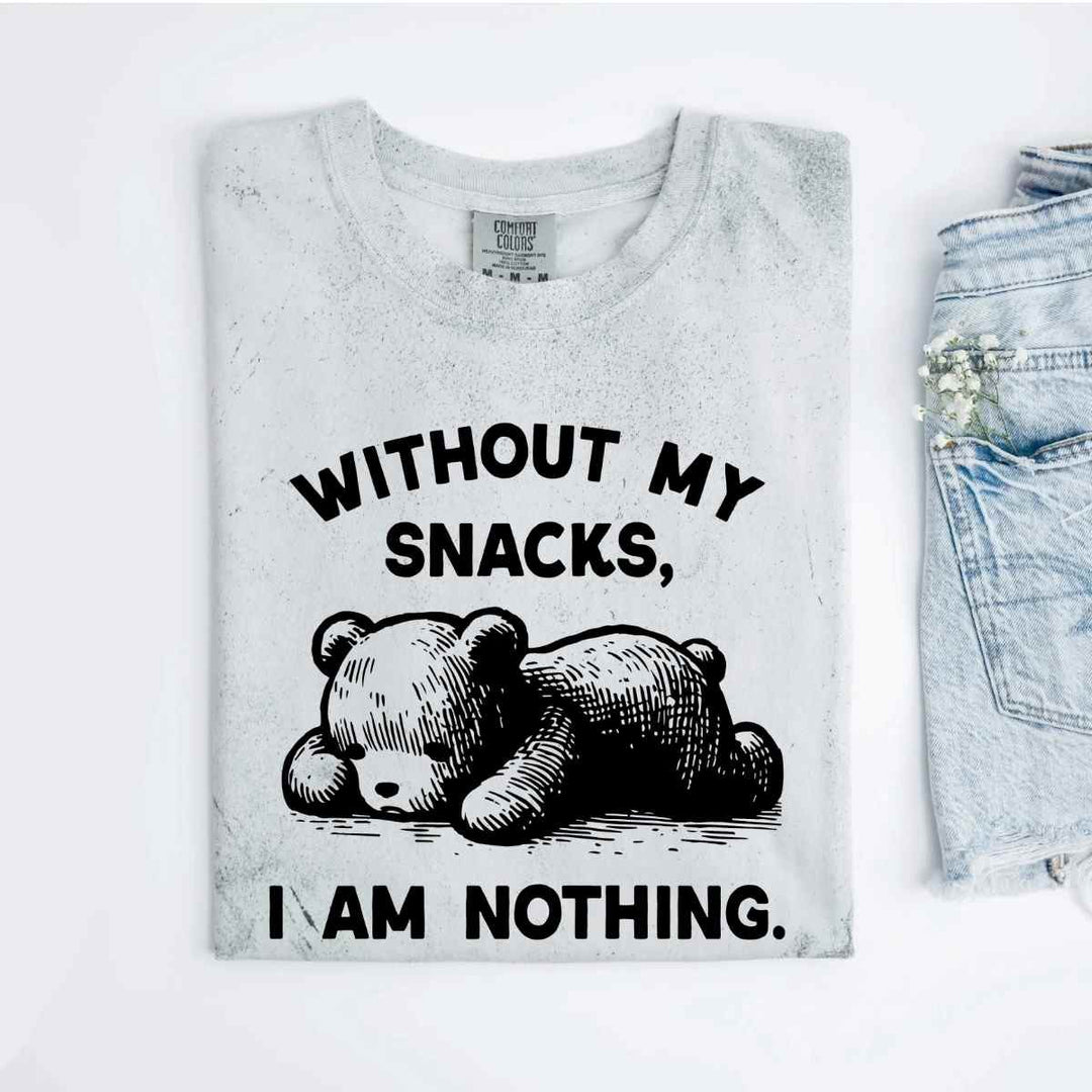 Mugsby | Without My Snacks I am Nothing Shirt | A gray shirt with an almost spray paint pattern. The graphic reads "Without my snacks, I am nothing." and depicts a bear lying face down.