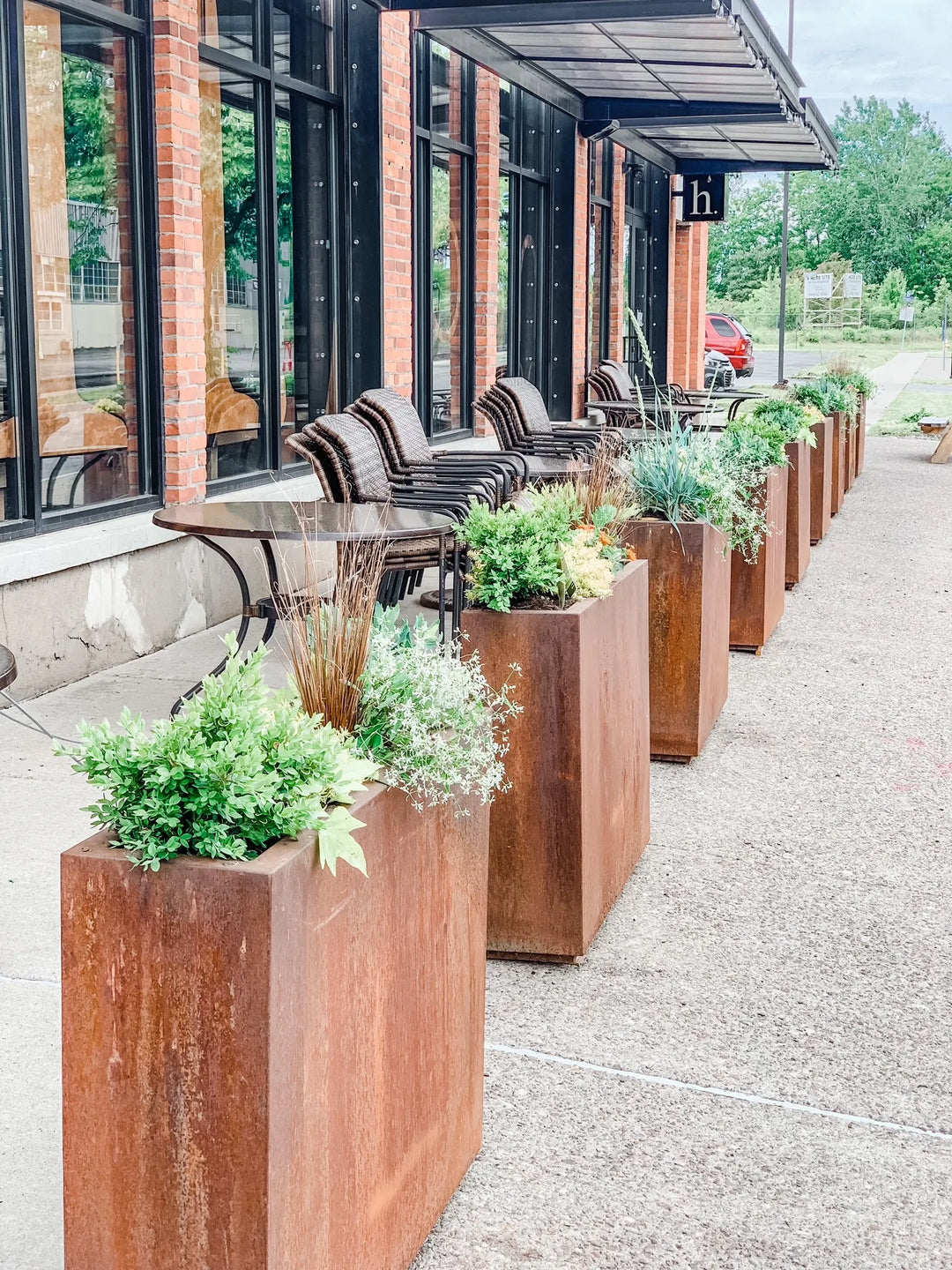 Nosh restaurant front container planters