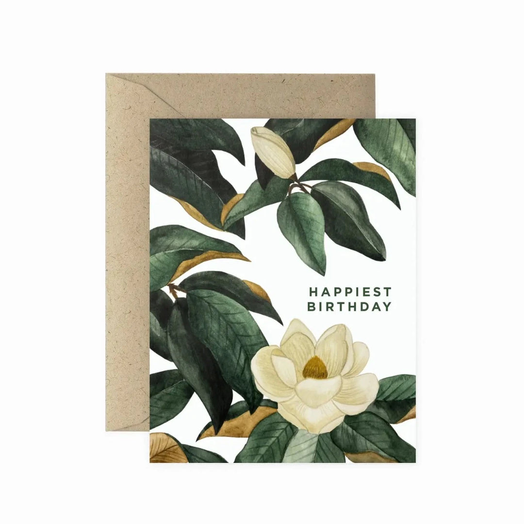 Paper Anchor | Magnolia Happiest Birthday Card | A white card with a watercolor magnolia design and text that reads "Happiest Birthday".