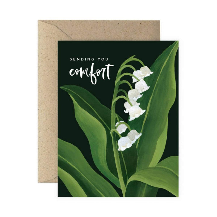 Sending You Comfort Sympathy Greeting Card | A dark colored card with a painted neutral flower design and text that reads "sending you comfort".
