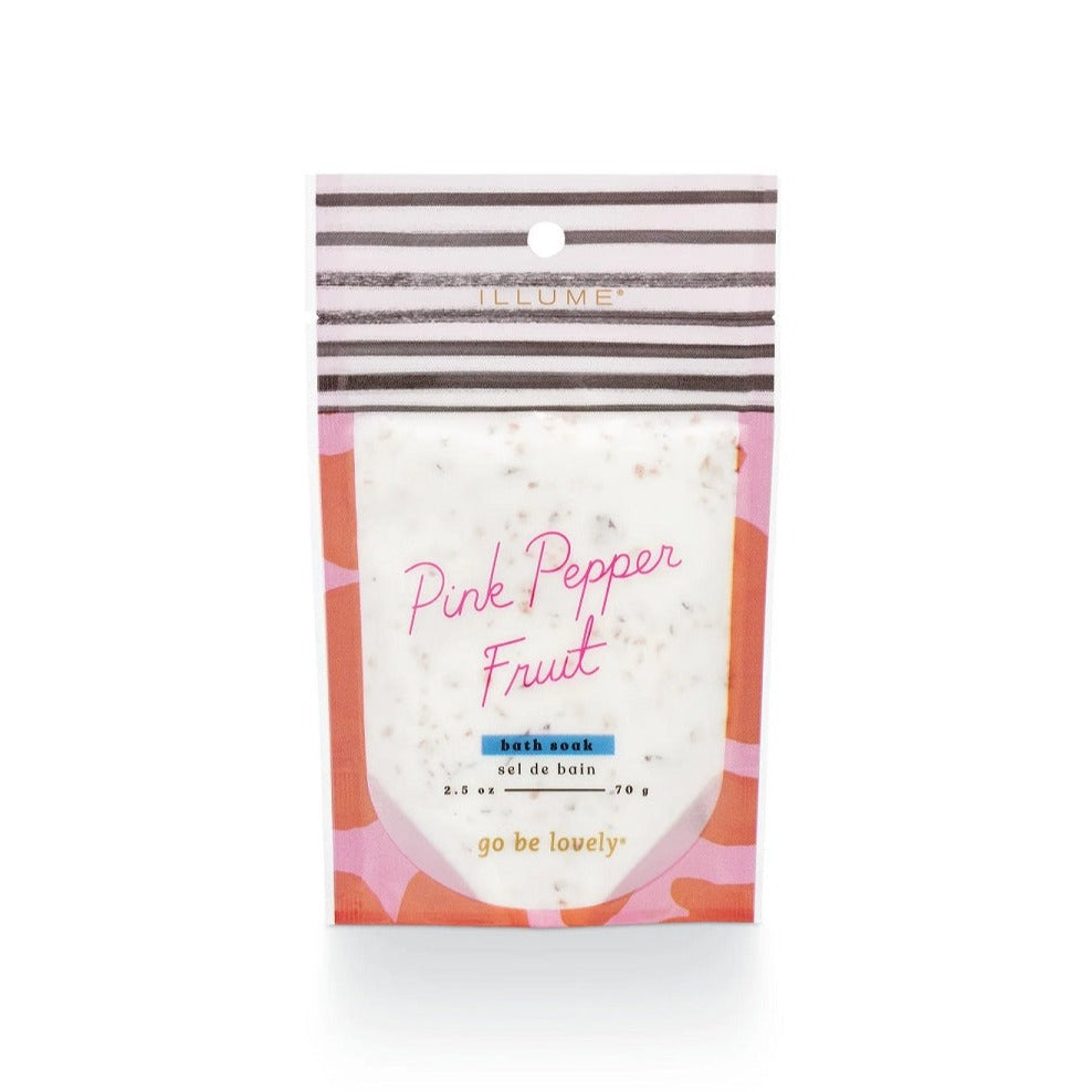 Illume Bath Soak | Pink Pepper Fruit, Bath soak, 2.5 oz, 70g, go be lovely. A pink and orange abstract pattern.