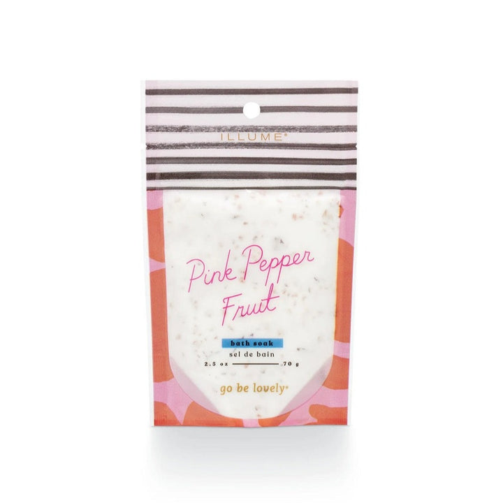 Illume Bath Soak | Pink Pepper Fruit, Bath soak, 2.5 oz, 70g, go be lovely. A pink and orange abstract pattern.