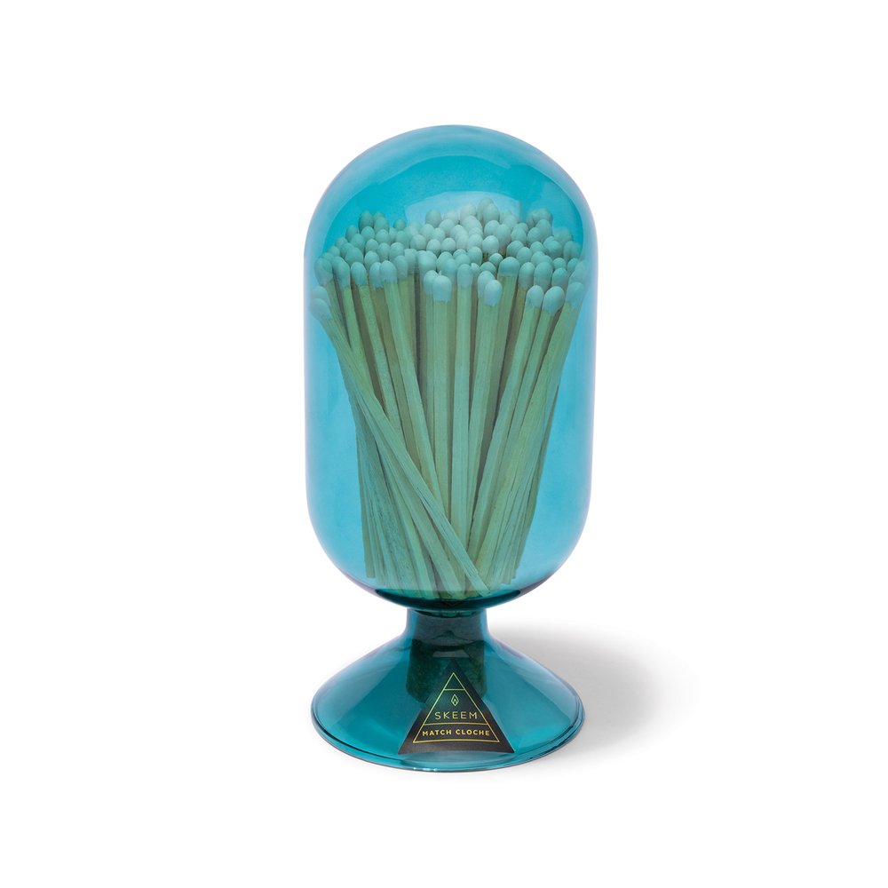 Skeem | Teal Match Cloche with white matches.