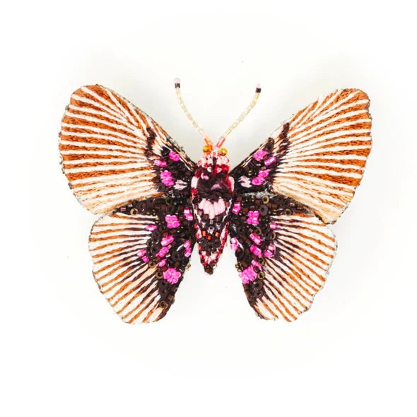 Butterfly Brooch beaded and embroidered with orange, cream, black, and pink with red accents.