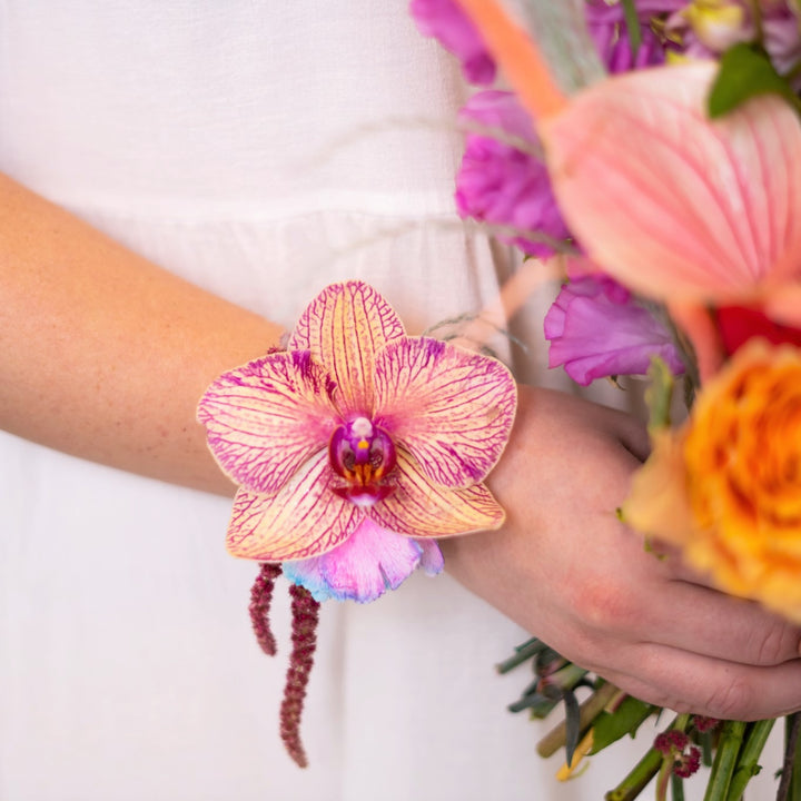 Orchid wrist corsage Rochester NY wedding florist
