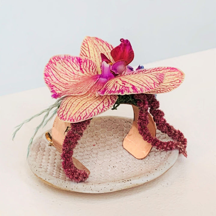 Orchid wrist corsage on rose gold cuff Rochester NY wedding florist