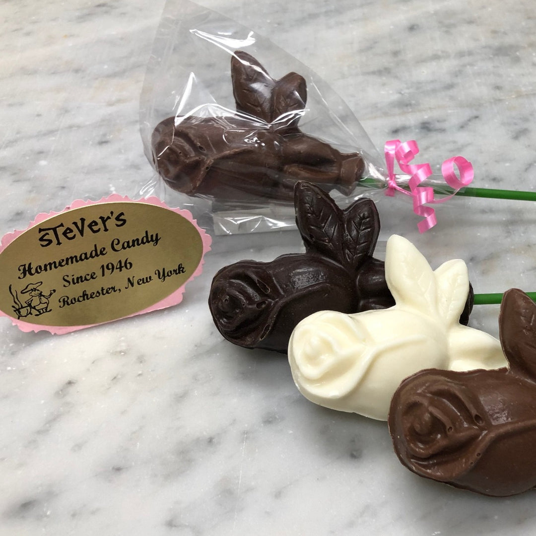 Stever's Candies | Chocolate rose in milk chocolate, dark chocolate, and white chocolate. Comes on a stick.