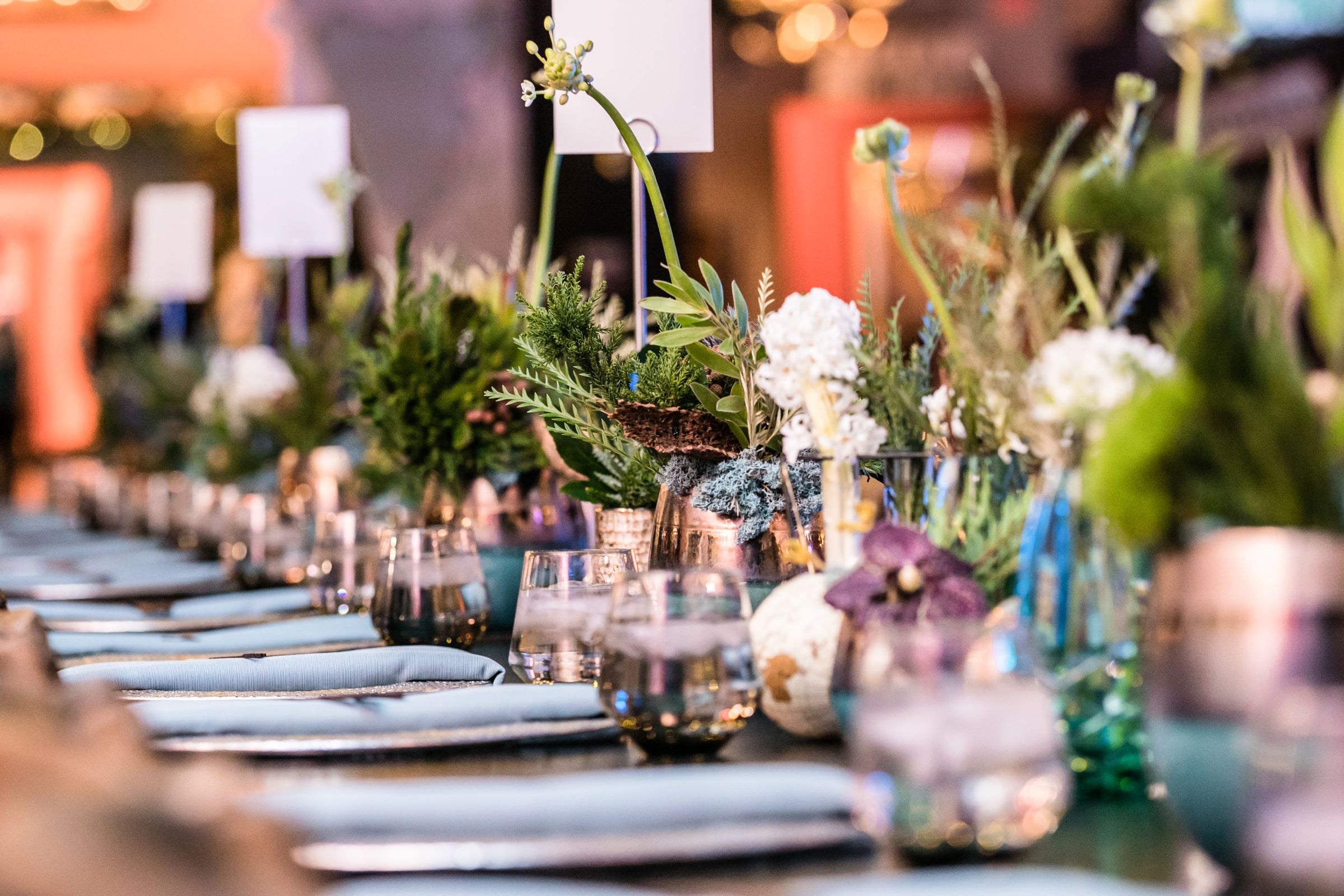 bar mitvah at artisan works table of all blue and purple centerpiece with bella events co