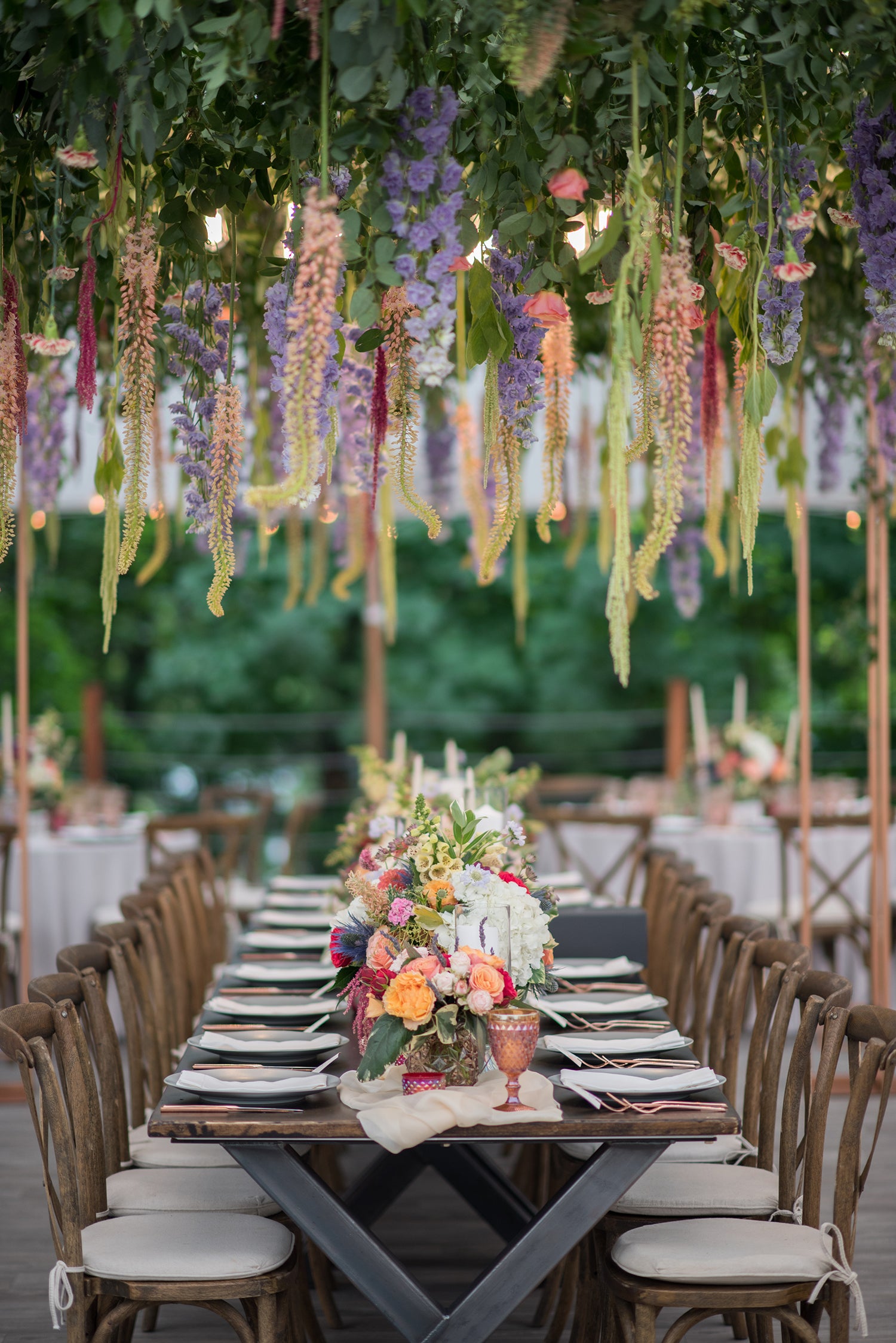 Whimsical tented wedding Pittsford new York with hanging flowers