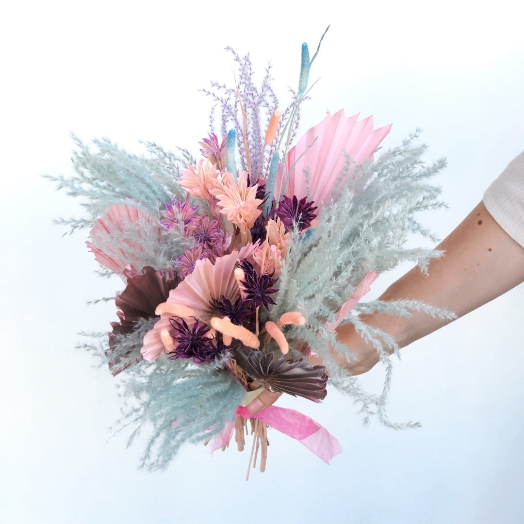 Dried Floral Bouquet | A pastel colored dried wrap featuring pompus, bunny tails, and other dried florals.