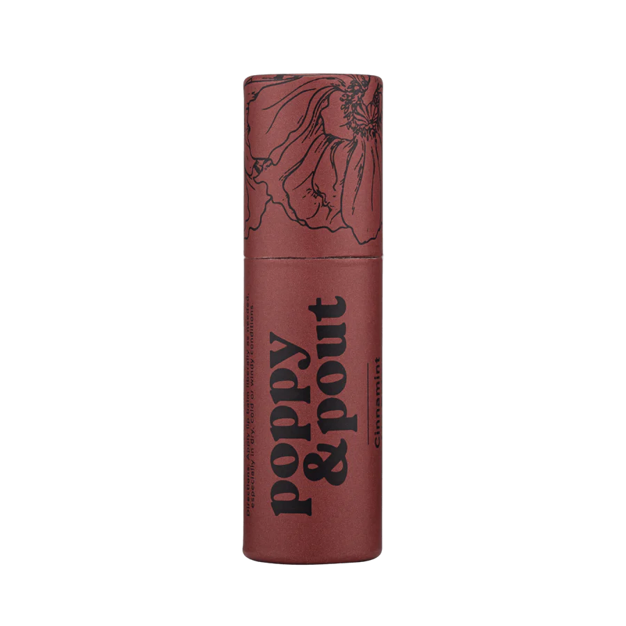 Poppy & Pout Lip Balm | A red lip balm stick with trendy black line illustration and text that reads "Poppy & Pout Cinnamint".
