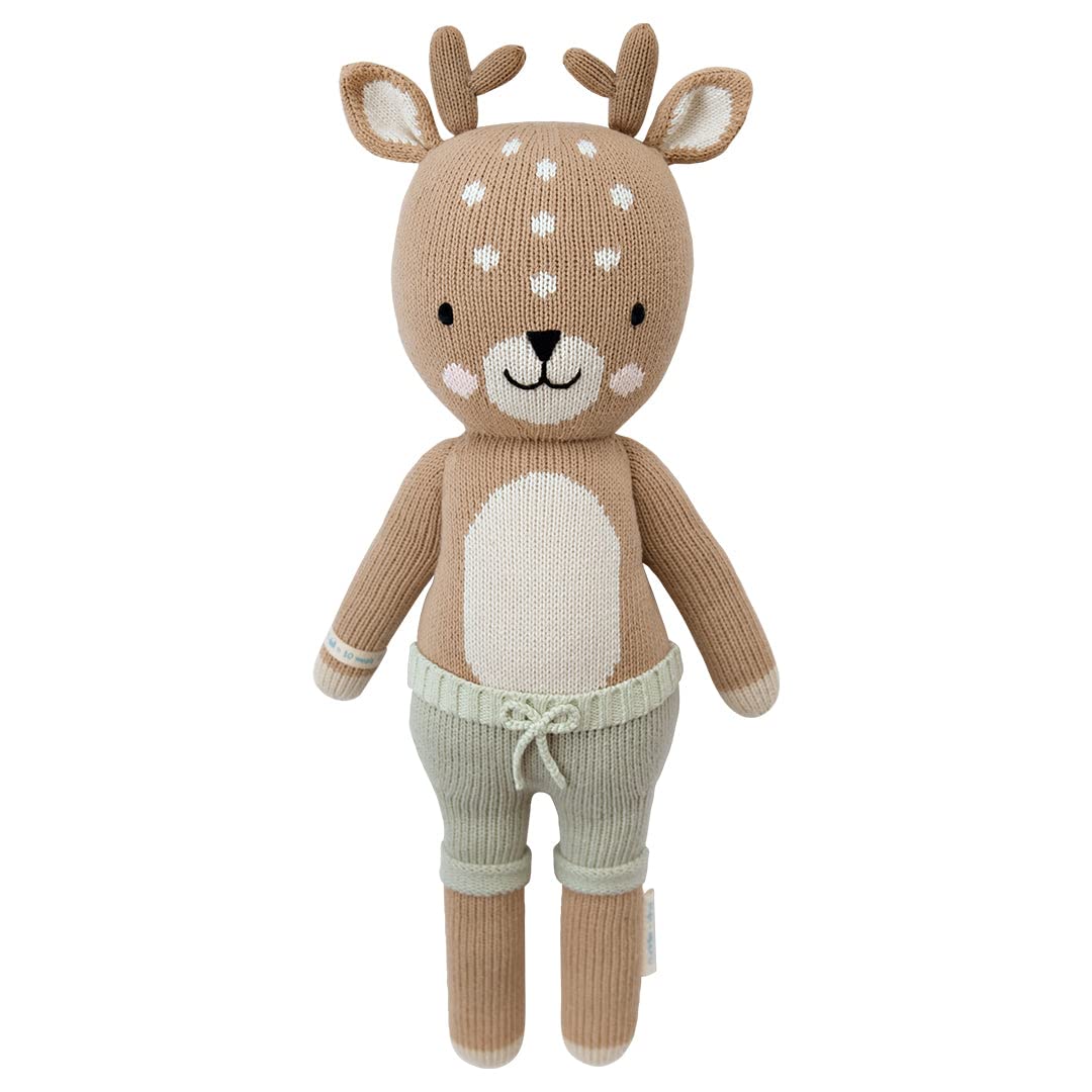 Elliot the Fawn Plush | Fawn plush with tiny antlers wearing light blue/green shorts.