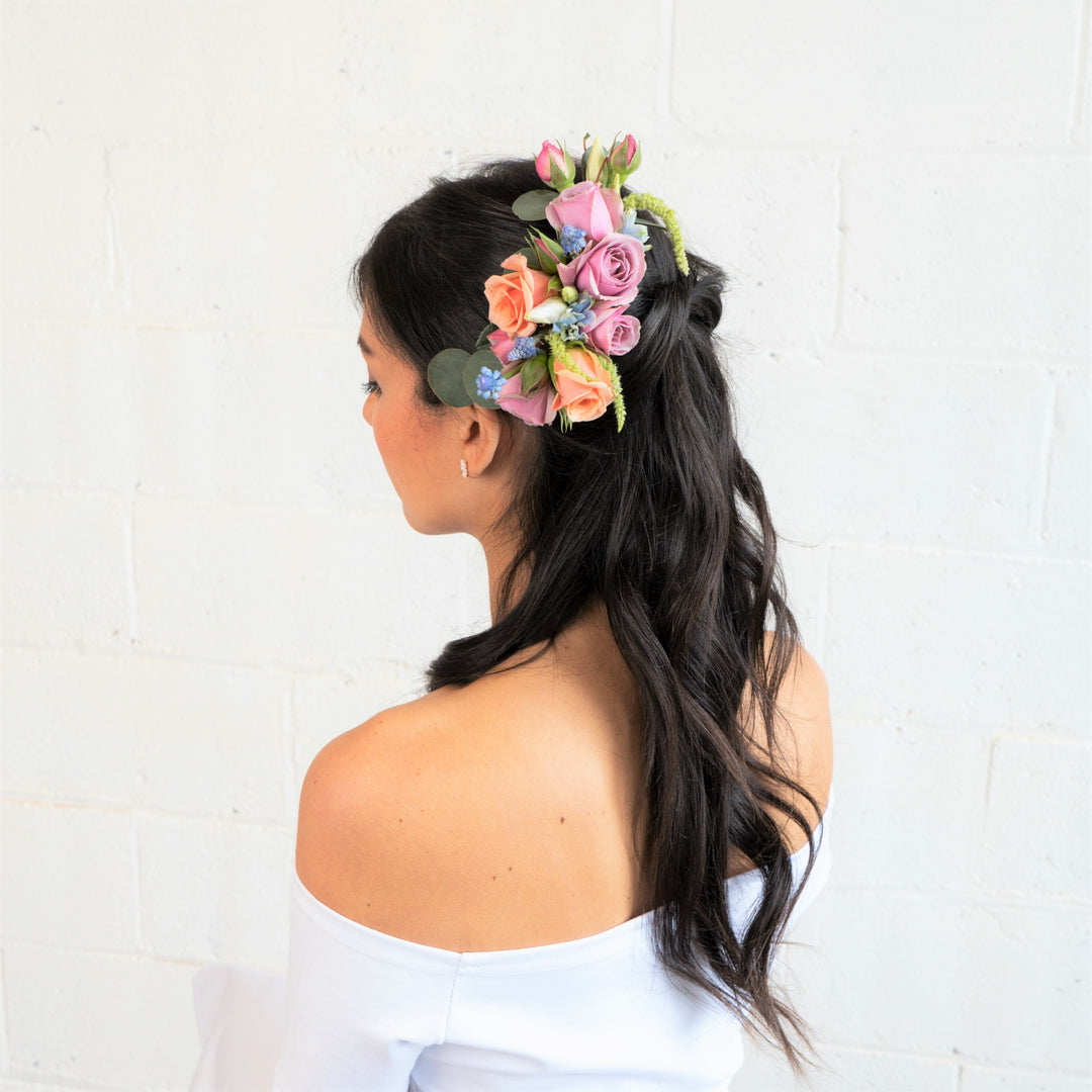 Floral hair comb with pastel color flowers Rochester wedding florist