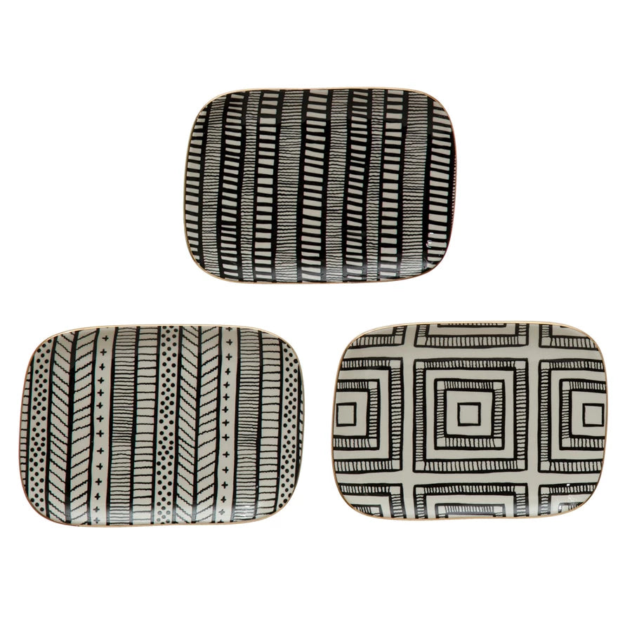 Geometric Plate | A stoneware plate with a black geometric pattern and gold rim. 3 styles shown.