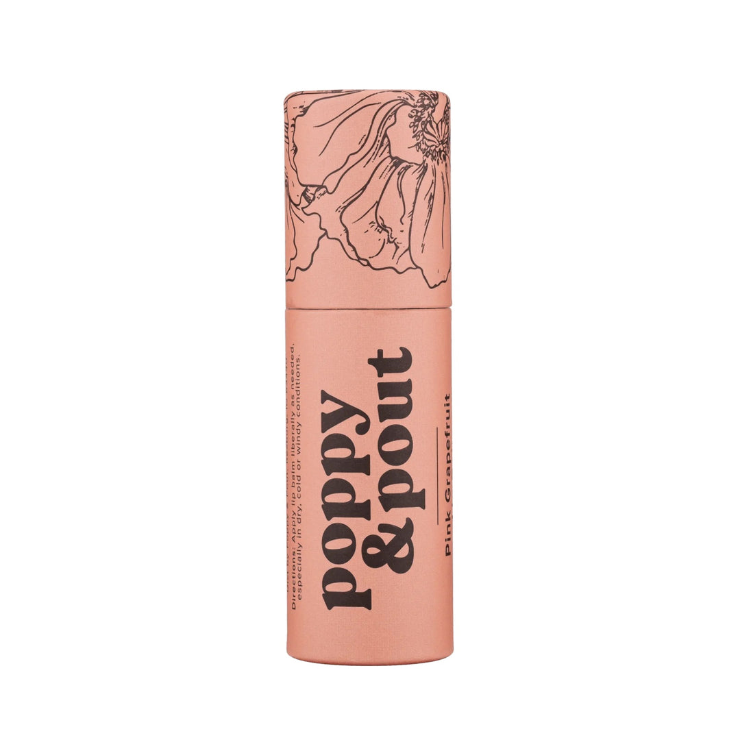 Poppy and Pout Lip Balm | Pink grapefruit lip balm in an ecofriendly container. Package is pink with a floral design on the lid.