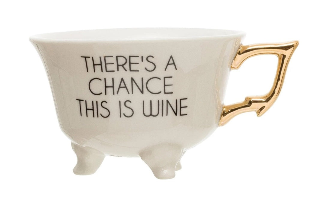 Saying Teacups | White Teacup with little feet and a gold handle. Reads "There's A Chance This Is Wine".