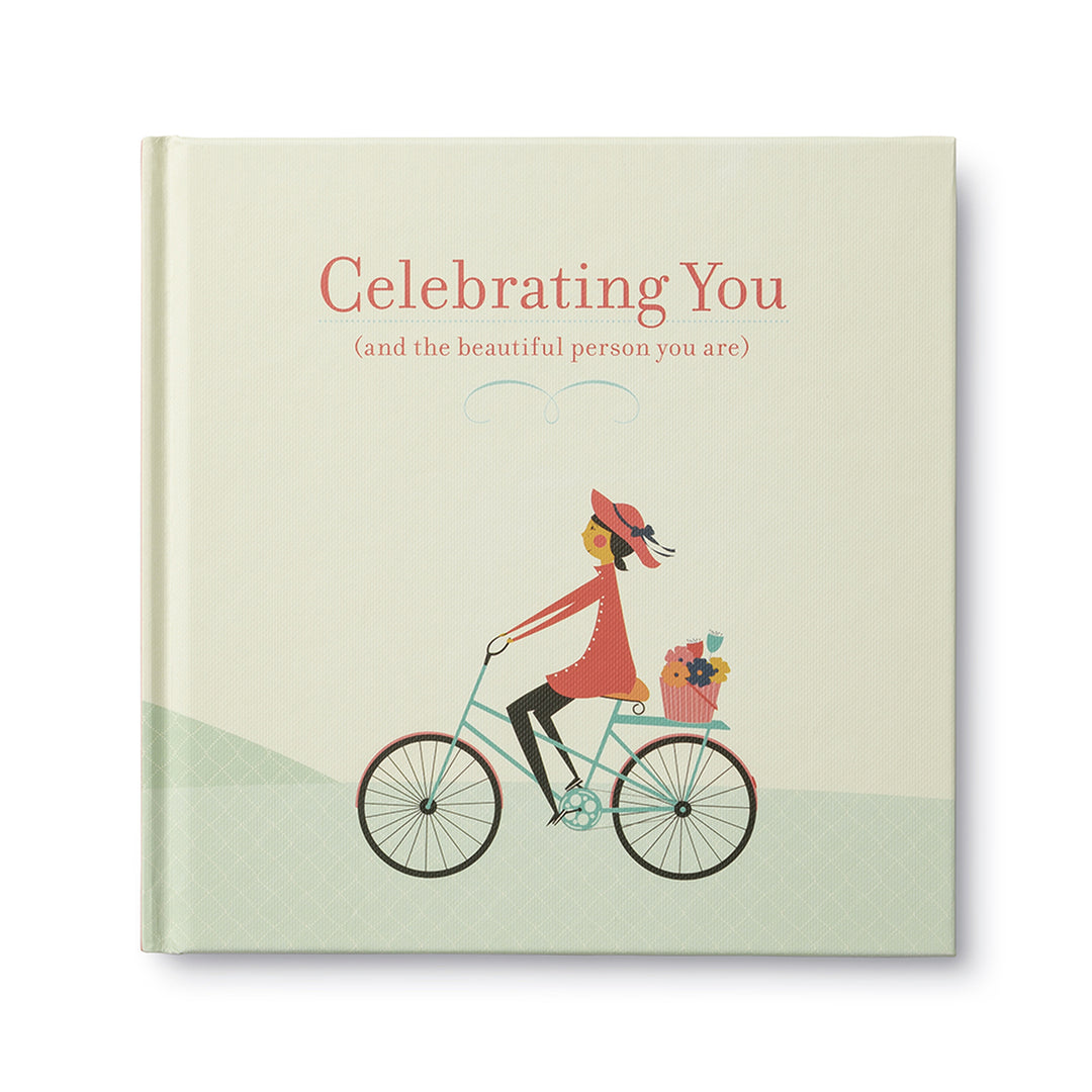 Celebrating You (and the beautiful person you are) | Cover shows a person in red riding a bicycle with a bucket of flowers on the back. Person is against a yellow and green background.