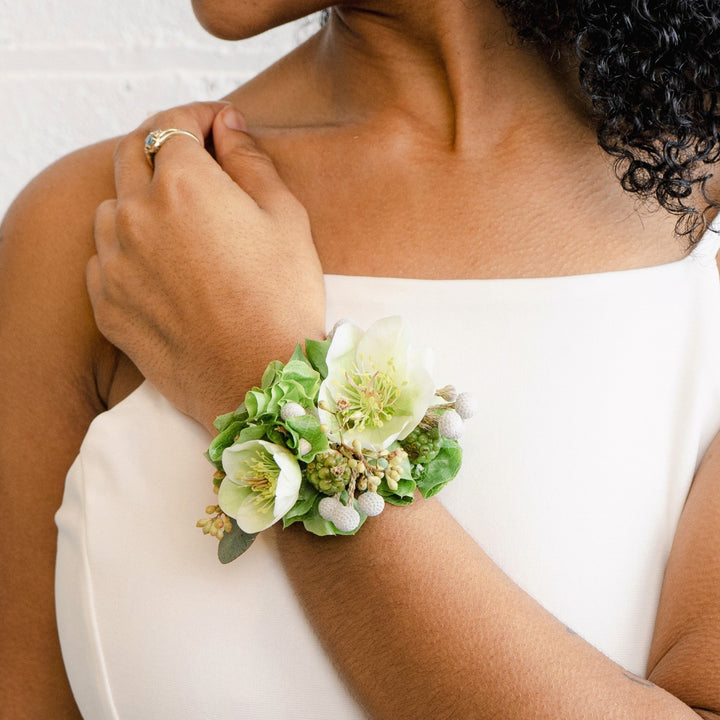 Greens and white wrist corsage wedding flowers Pittsford Ny