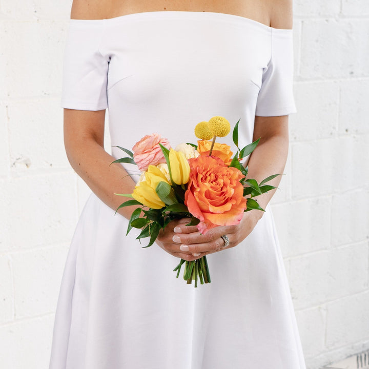 orange and yellow bouquet wedding florist