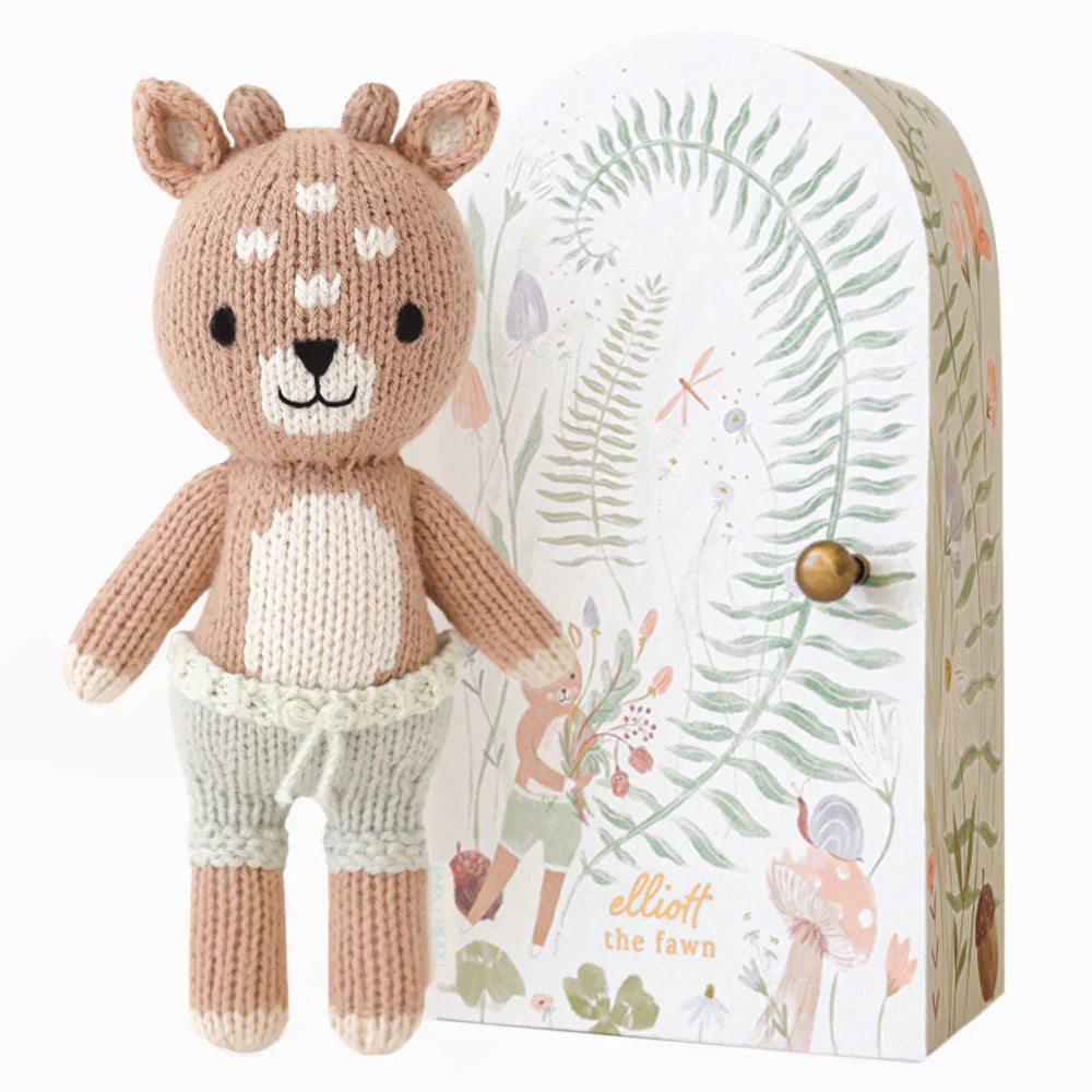 Tiny Elliot the Fawn Plush | Fawn plush with tiny antlers wearing light blue/green shorts.