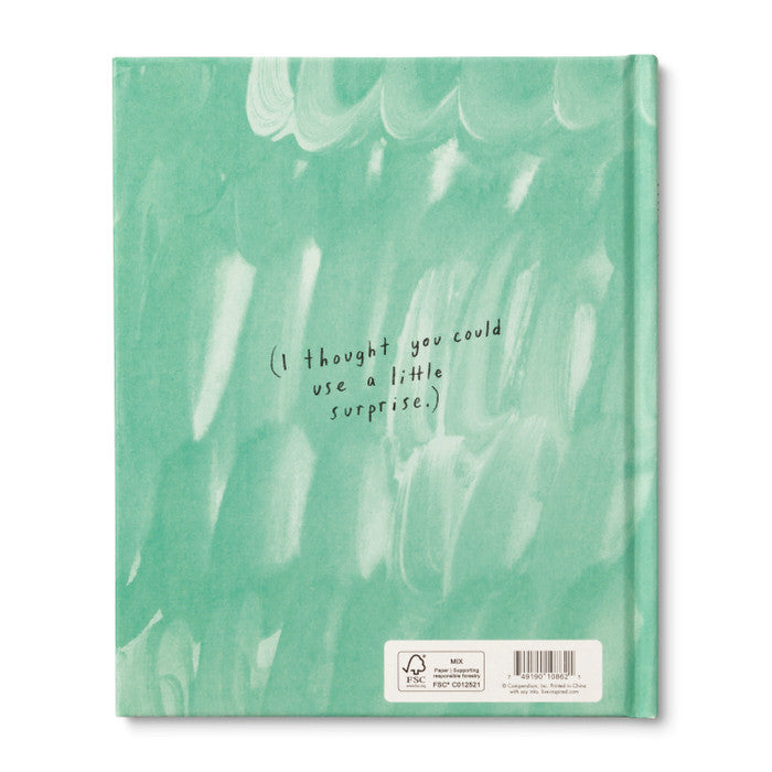 This isn't a Book (It's a Hug in Disguise) | Compendium | A mint green back cover with text "I thought you could use a little surprise".