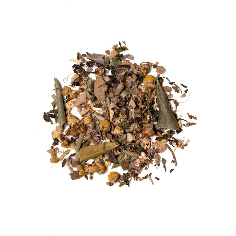123 Farm | Olive Leaf Tea | Heap of dried herbs and leaves on a white background