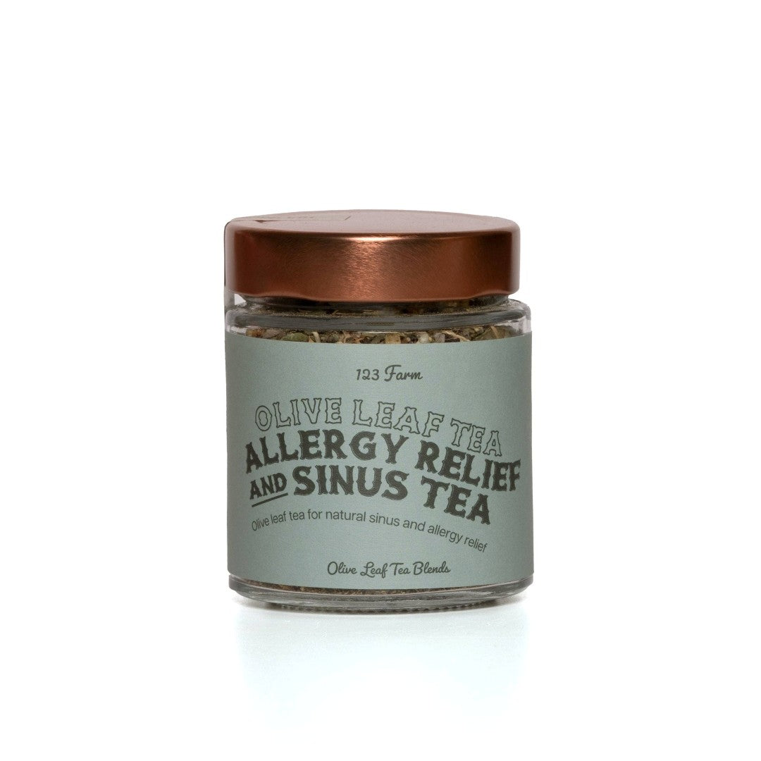 123 Farm | Jar of olive leaf tea for allergy relief and sinus relief on a white background