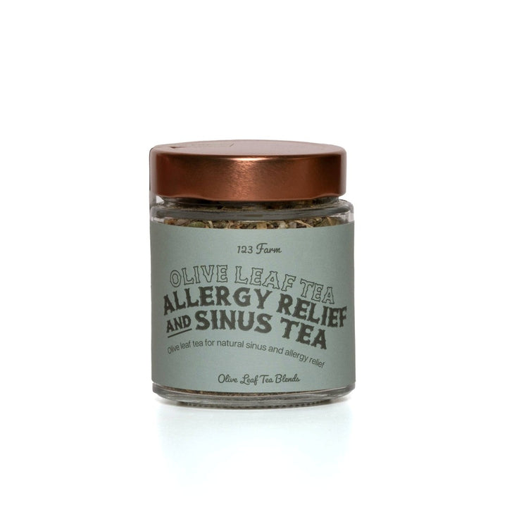 123 Farm | Jar of olive leaf tea for allergy relief and sinus relief on a white background