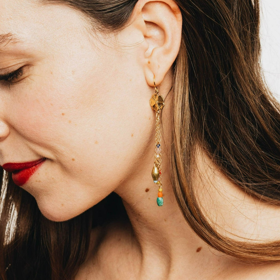 Nest Pretty Things | Long Flower Charm Earrings | Earring shown on a model for scale.