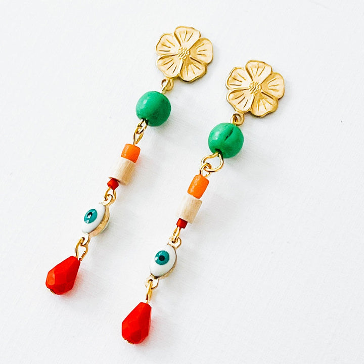 Nest Pretty Things | Long Flower Evil Eye Stud Earrings | Flexible dangling earrings with a flower, colorful beads, and an evil eye.