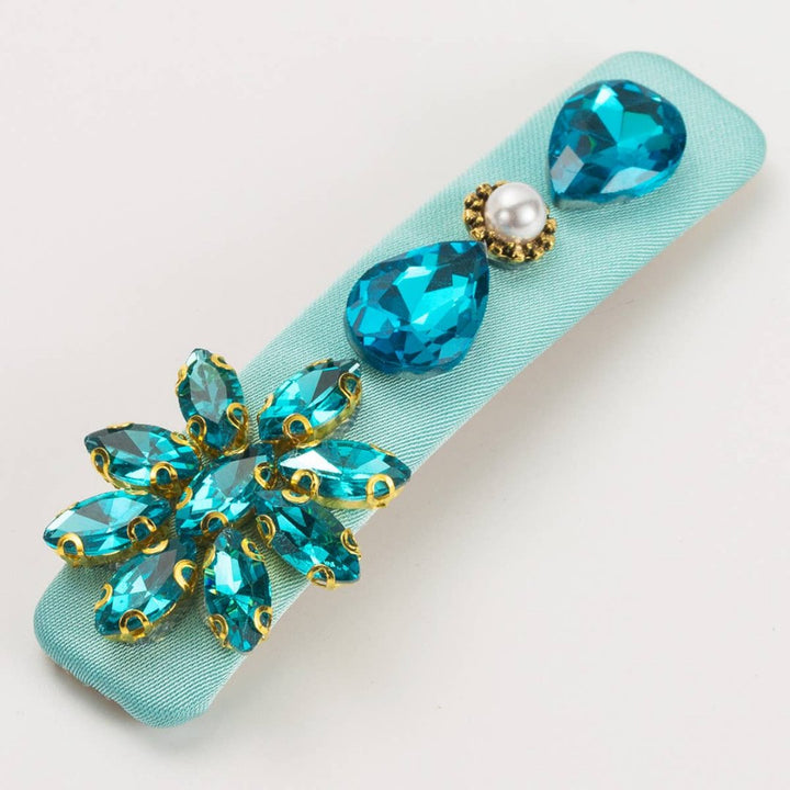 Accity | Blue Hairpin | Blue studded with gold accents.