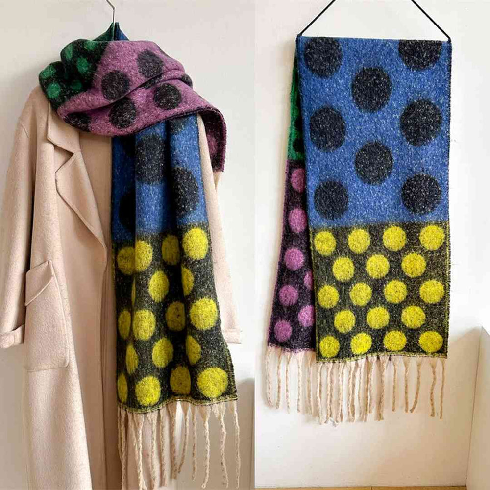 Accity | A blue yellow, green, pink, and black winter scarf.