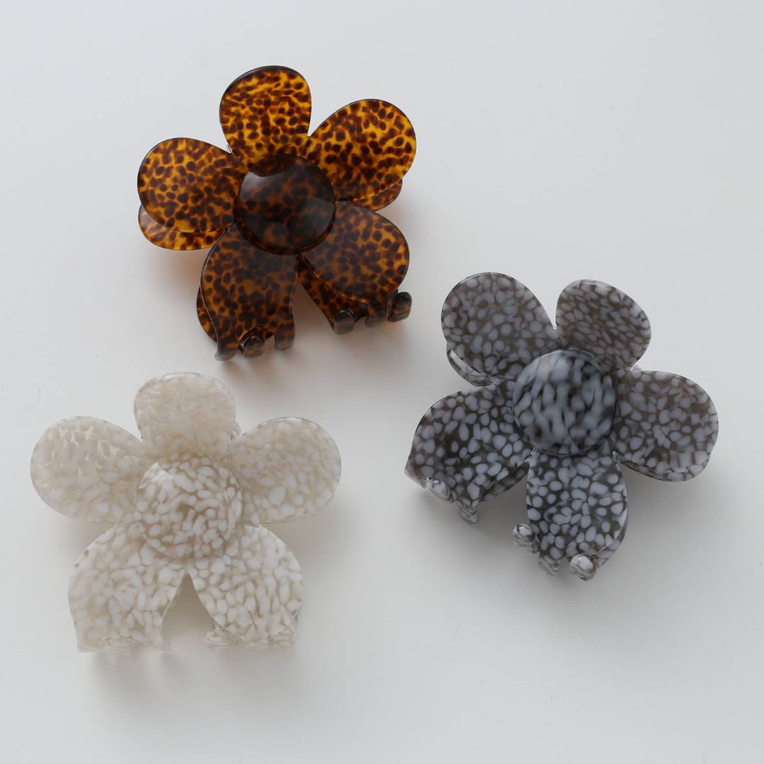 Adorro | Vintage Jasmine Hair Clip | Flower Shaped the the colors brown, gray, and white.