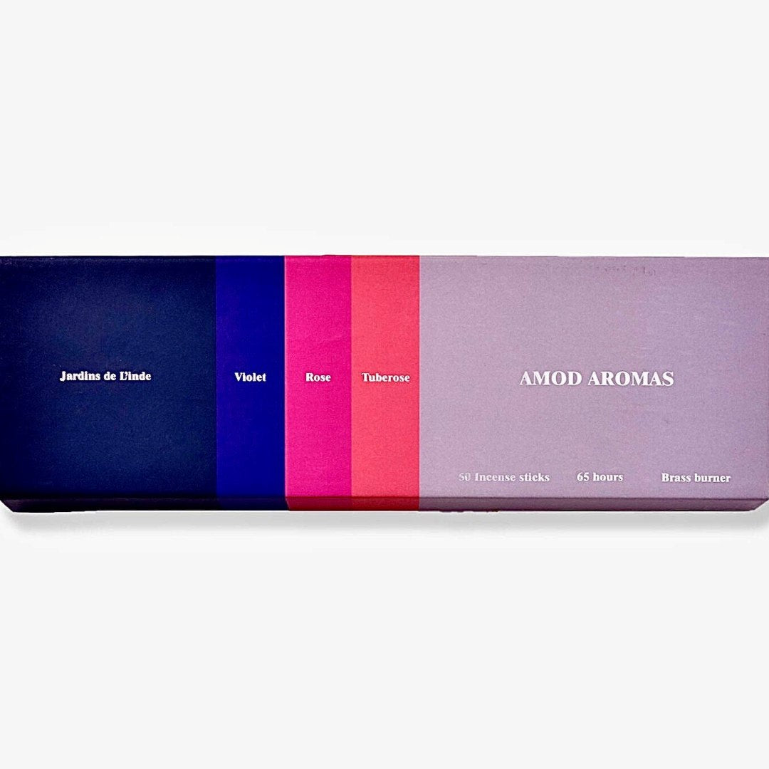 Amod | Jardins De L'inde Incense | AMOD AROMAS product packaging with color swatches on a white background. Scent, violet, rose, tuberose.