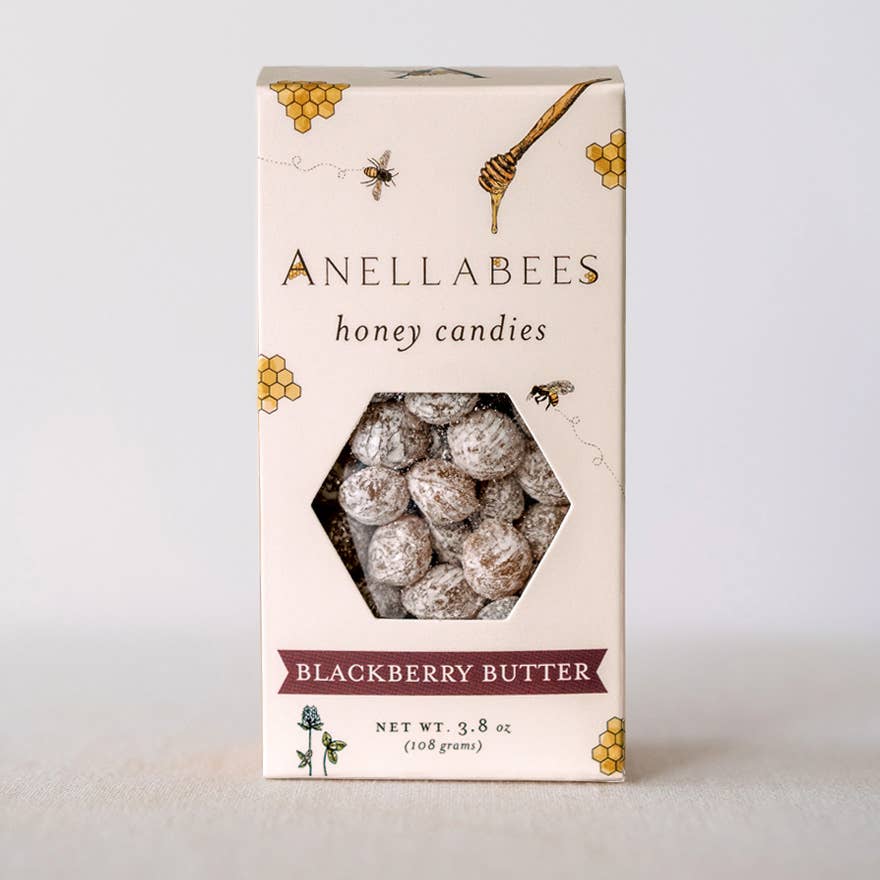 Anellabees | Box of Anellabees honey candies with blackberry butter flavor on a light gray background