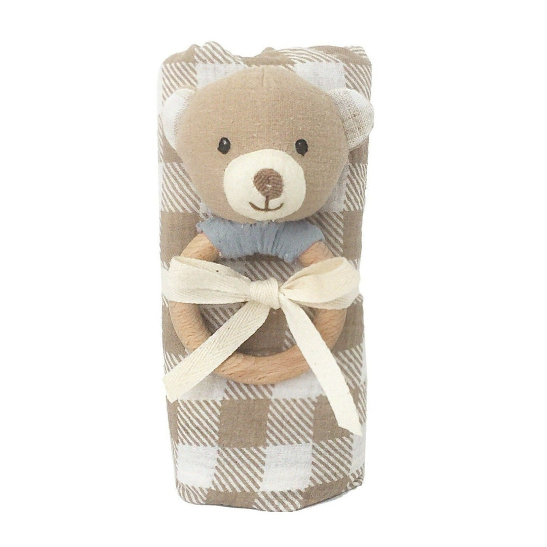 Bear Swaddle and Rattle Set | Bear rattle tied with a checkered blanket.