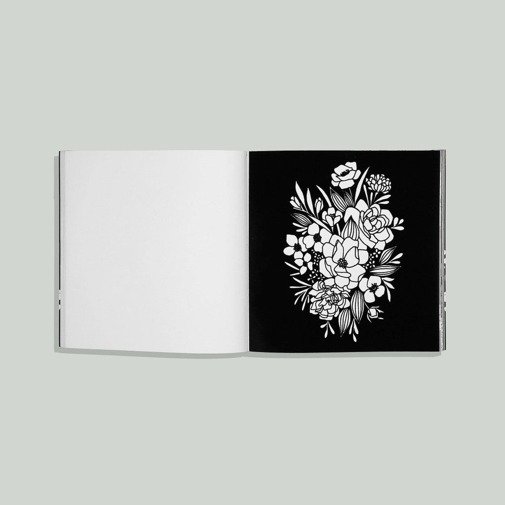 Paige Tate & Co. | Bloom | Adult coloring book | A black and white book with floral patterns.