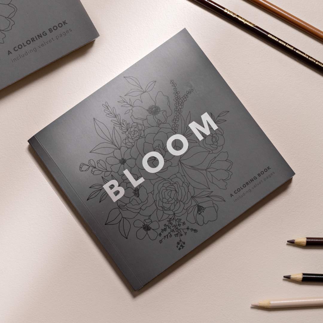 Paige Tate & Co. | Bloom | Adult Coloring Book Mini | A black cover.