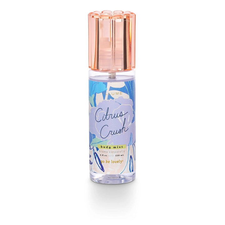 Illume Body Mist | A citrus crush scented body mist in a blue floral patterned spray bottle.