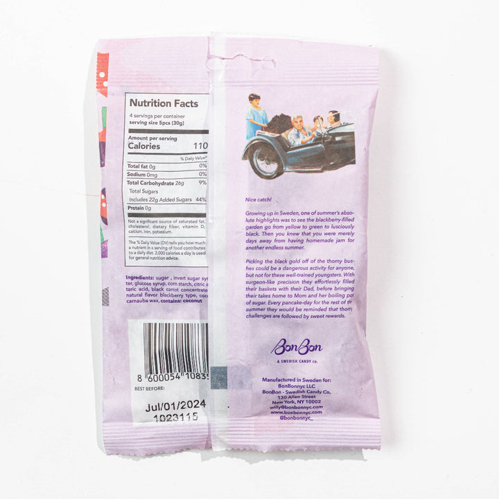 Purple package with text and a bar code on a white background