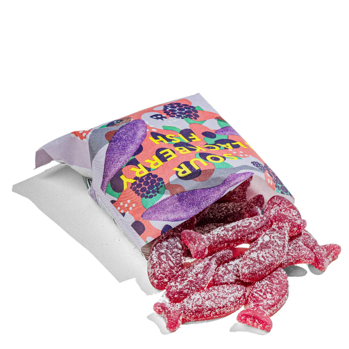 Colorful bag of gummy worms on a white background